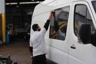 13999872-worker-cleaning-car-with-pressured-water-Stock-Photo-car-wash-washing